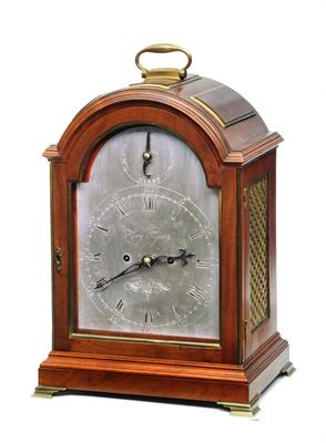 Lot 17 - A GEORGE III MAHOGANY BRACKET CLOCK the break arch silvered Roman dial with Arabic five minutes