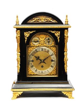 Lot 32 - A WINTERHALDER & HOFMEIER BRACKET OR TABLE CLOCK the brass dial with silvered Roman chapter ring