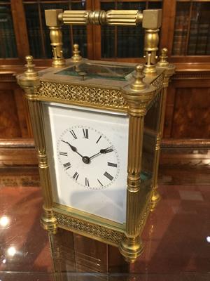 Lot 37 - A 19TH CENTURY FRENCH CARRIAGE CLOCK with white enamel Roman dial