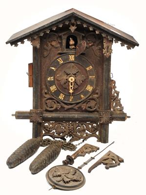 Lot 54 - A LATE 19TH CENTURY CONTINENTAL STAINED AND CARVED WOOD CUCKOO CLOCK