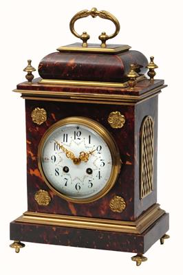 Lot 55 - A TORTOISESHELL AND GILT BRASS MOUNTED MANTEL CLOCK the convex white enamel Arabic dial with floral