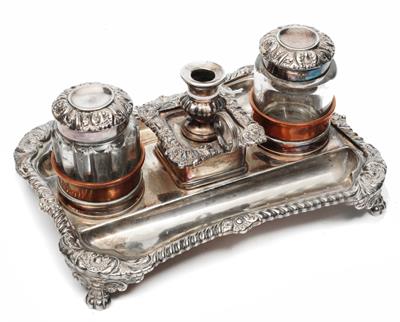Lot 81 - A 19TH CENTURY SILVER PLATED INK STAND fitted with two glass inkwells flanking a miniature
