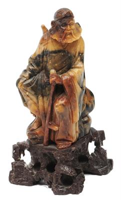 Lot 103 - A CHINESE CARVED SOAPSTONE FIGURE