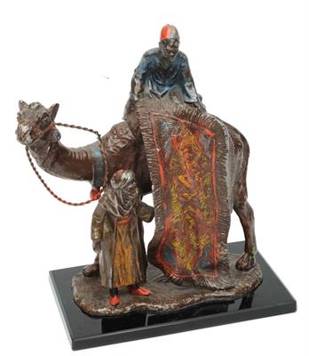 Lot 138 - AN AUSTRIAN PAINTED SPELTER FIGURE of a carpet seller