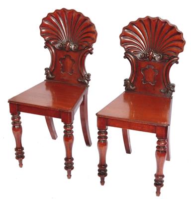 Lot 229 - A PAIR OF VICTORIAN MAHOGANY HALL CHAIRS with shell carved backs