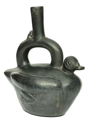 Lot 301 - A CHIMU (PERU) BLACK POTTERY VESSEL in the form of a duck with small prehensile-tailed monkey on the