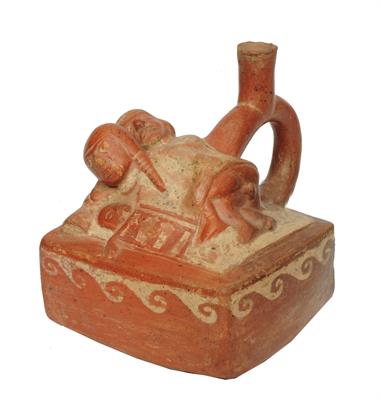 Lot 306 - A MOHICA (PERU) RED CLAY SPOUT AND BRIDGE VESSEL