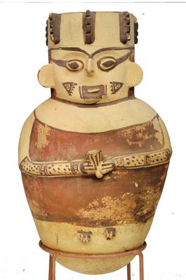 Lot 312 - A CHANCAY (PERU) CLAY VOTARY VESSEL in the form of a human figure holding a libation cup with