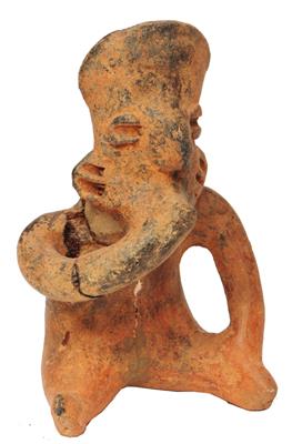Lot 336 - A NAYARIT (MEXICO) RED CLAY FIGURE of a squatting man with hand to mouth