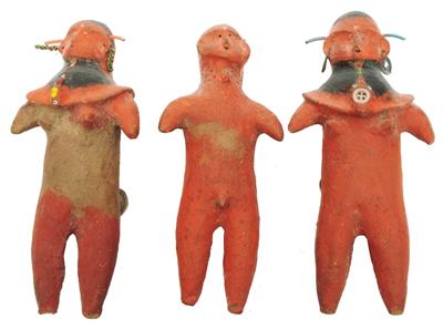 Lot 365 - A GROUP OF THREE SAMBURU RED CLAY EFFIGY DOLLS with painted and beaded ornament