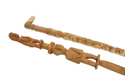 Lot 399 - AN OCEANIC CARVED WOOD STAFF with emblematic ornament