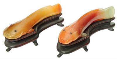 Lot 406 - A PAIR OF JAPANESE COLOURED HARDSTONE MODELS OF MUD FISH on hardwood stands