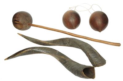 Lot 408 - AN AFRICAN CARVED WOODEN LADLE with stick handle and incised decoration