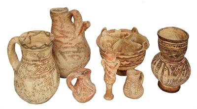Lot 431 - A GROUP OF SEVEN EARLY ARAB POTTERY VESSELS of varying style with slip geometric and linear motifs
