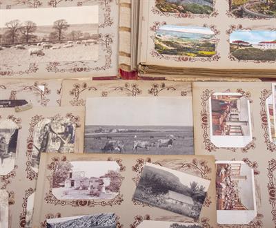 Lot 73 - AN ALBUM OF EARLY 20TH CENTURY POSTCARDS