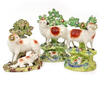 Lot 130 - A NEAR PAIR OF VICTORIAN STAFFORDSHIRE MODELS