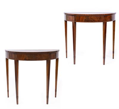 Lot 142 - A PAIR OF GEORGIAN STYLE FLAME MAHOGANY DEMI LUNE TABLES