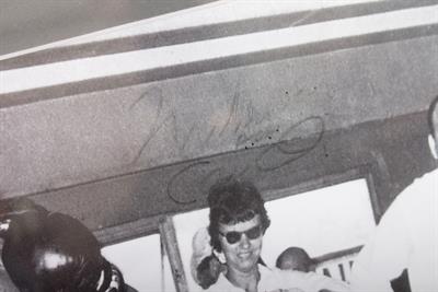 Lot 216 - A MUHAMMAD ALI SIGNED PHOTOGRAPH