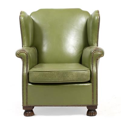 Lot 335 - A GREEN STUDDED LEATHER UPHOLSTERED WING BACK  CHAIR