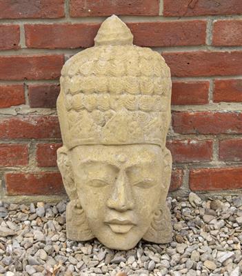Lot 343 - A TIBETAN STYLE CAST RECONSTITUTED STONE HEAD OR PLAQUE