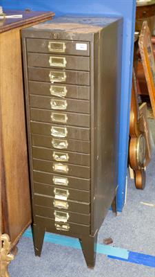 Lot 391 - A GREEN PAINTED STEEL FIFTEEN DRAWER FILING CABINET