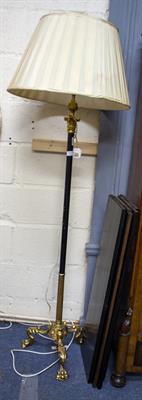 Lot 393 - A 20TH CENTURY GILT AND BLACK LAMP STANDARD