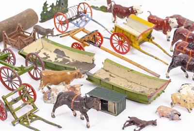 Lot 422 - A COLLECTION OF EARLY 20TH CENTURY BRITIANS LIMITED LEAD FARM ANIMALS AND MACHINERY