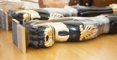 Lot 439 - FOUR EBONY AND GILT PAINTED TERMS