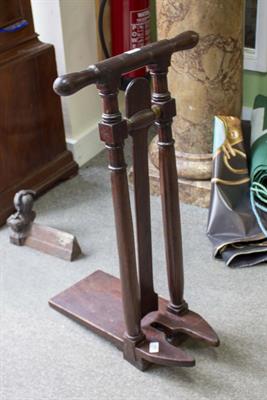 Lot 514 - A VICTORIAN MAHOGANY AND BRASS BOOT JACK