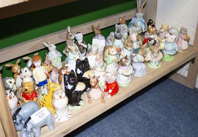 Lot 523 - A COLLECTION OF BESWICK WINNIE THE POOH AND BEATRIX POTTER FIGURES