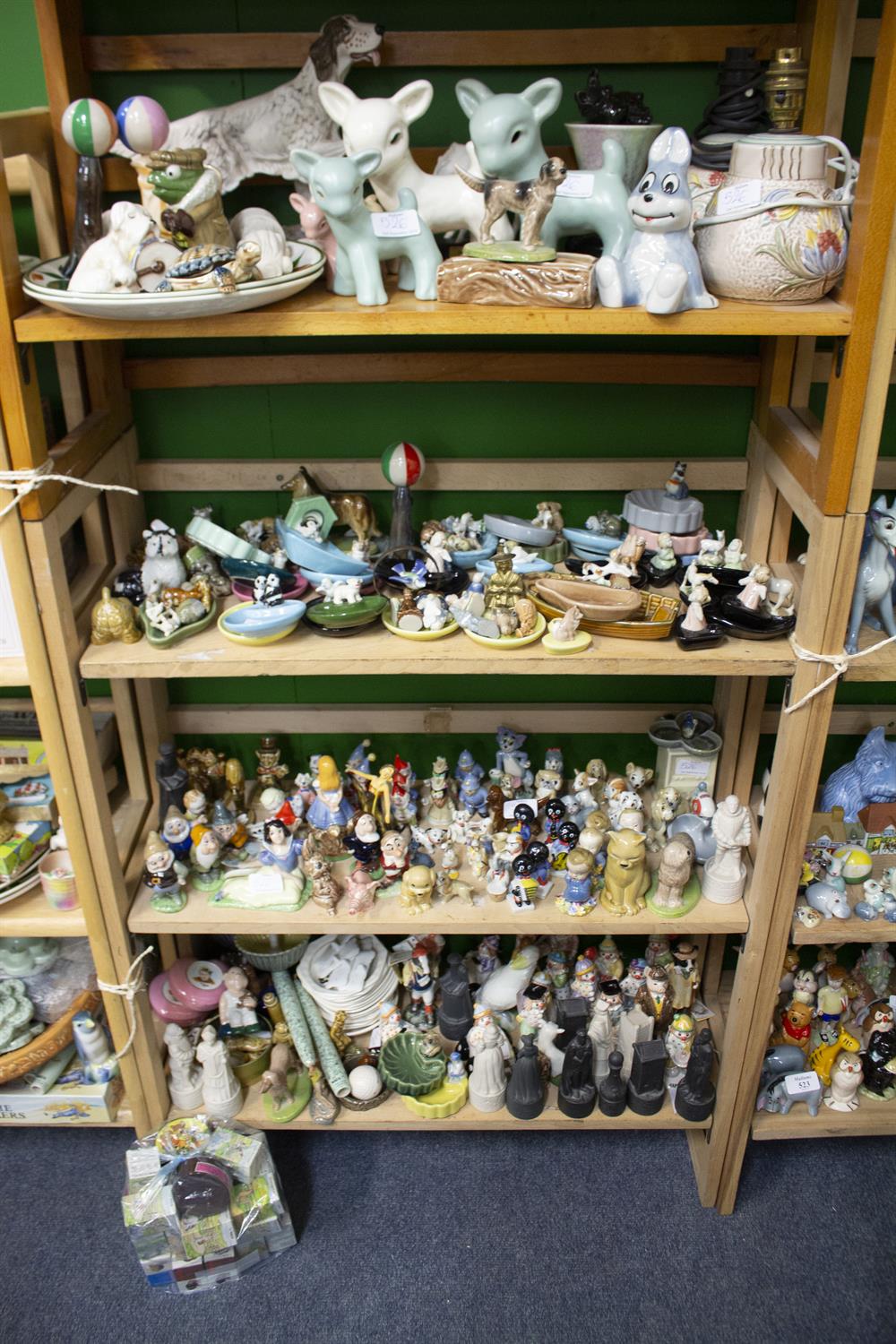 Lot 526 - A VERY LARGE COLLECTION OF WADE POTTERY FIGURES