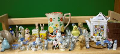 Lot 526 - A VERY LARGE COLLECTION OF WADE POTTERY FIGURES