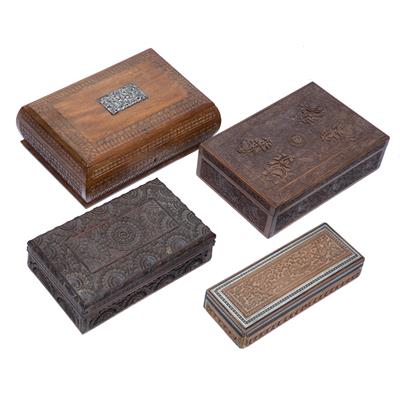 Lot 10 - Four wooden carved boxes