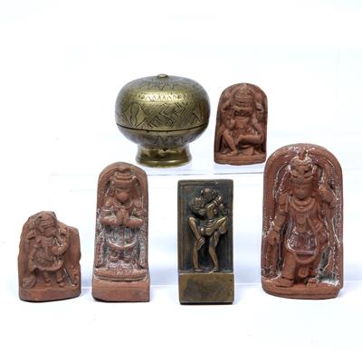 Lot 66 - Four terracotta carvings