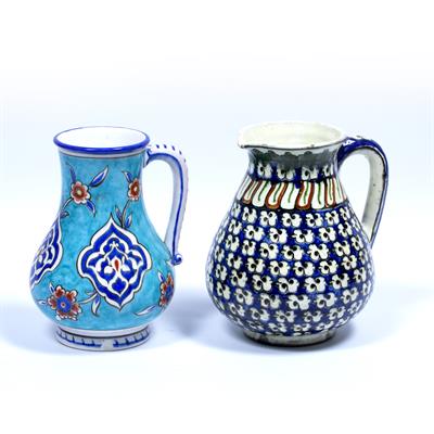 Lot 87 - Two Iznik style jugs