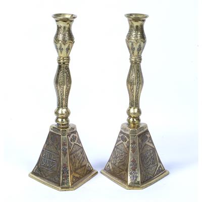 Lot 108 - Pair of Cairo ware candle sticks