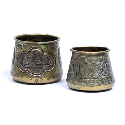 Lot 132 - Two Cairoware beakers