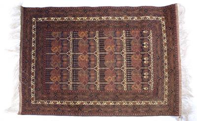 Lot 210 - Afghan rust ground rug