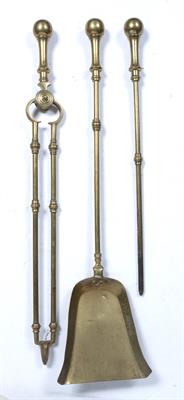 Lot 314 - Set of brass fire irons