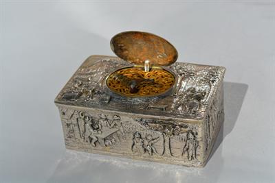 Lot 401 - Silver cased singing bird automaton box