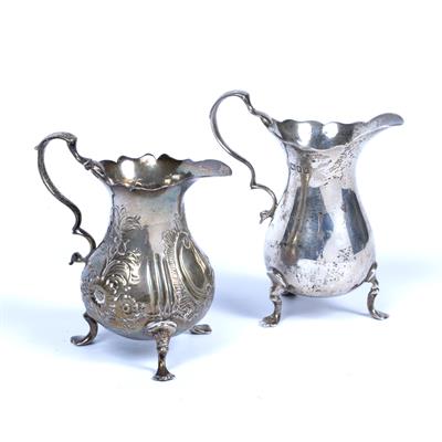 Lot 407 - Two silver cream jugs