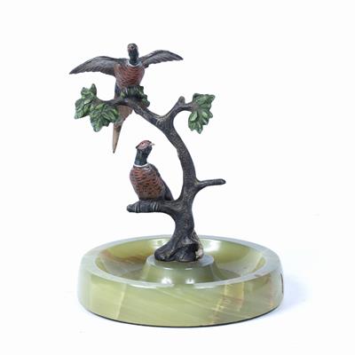 Lot 454 - Cold painted ring stand