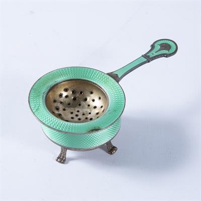 Lot 480 - Norwegian silver and Guilloché enamel tea strainer