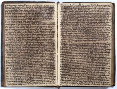 Lot 838 - AN 18TH CENTURY LEATHER BOUND MANUSCRIPT BOOK c.218. pp. in a fine small hand in black ink. much