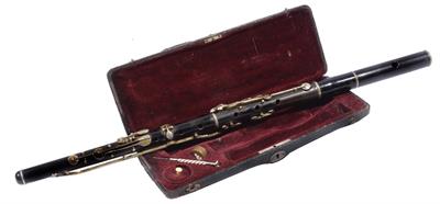 Lot 114 - A 19TH CENTURY EIGHT KEY FLUTE in original morocco leather covered case