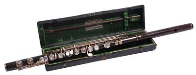 Lot 115 - A RUDDALL CARTE OPEN G SHARP 1867 PATENT FLUTE with silvered keys and cleaning rod