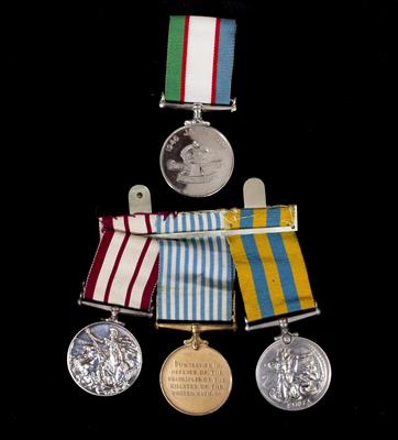 Lot 153 - A SET OF FOUR 20TH CENTURY SERVICE MEDALS