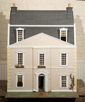 Lot 244 - A GEORGIAN STYLE DOLLS HOUSE