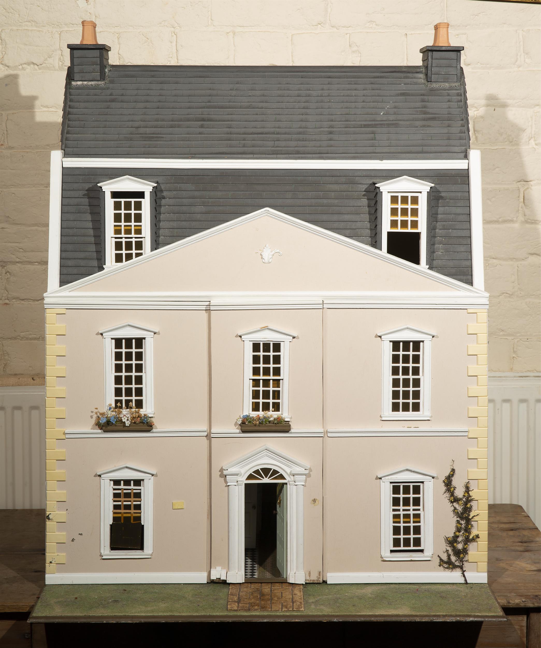 Lot 244 A GEORGIAN STYLE DOLLS HOUSE