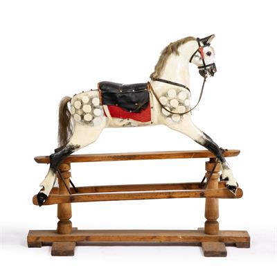 Lot 250 - A CARVED PAINTED WOODEN ROCKING HORSE